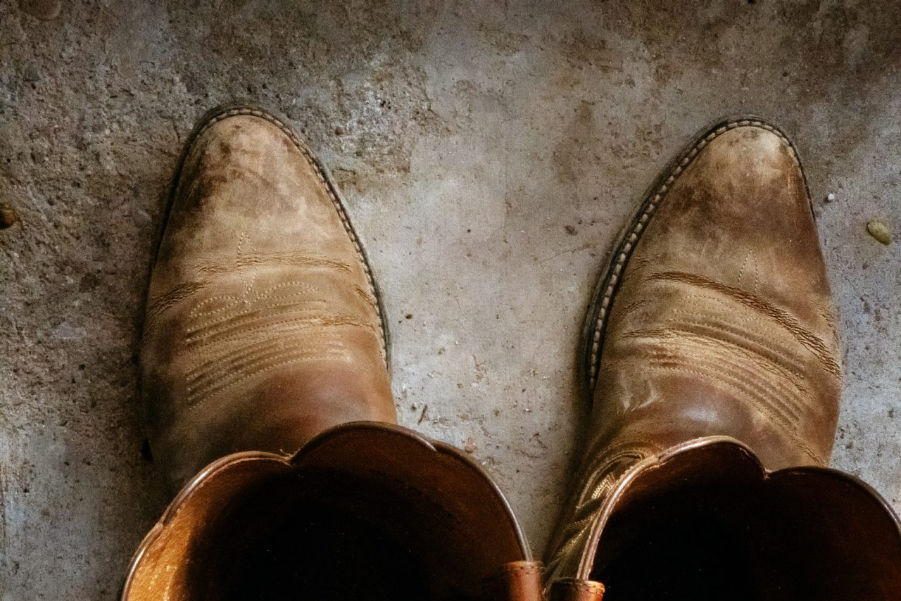 pair of brown leather cowboy boots
